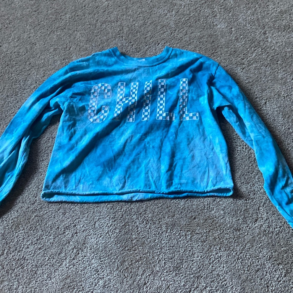 Blue long sleeve shirt with chill on the front
